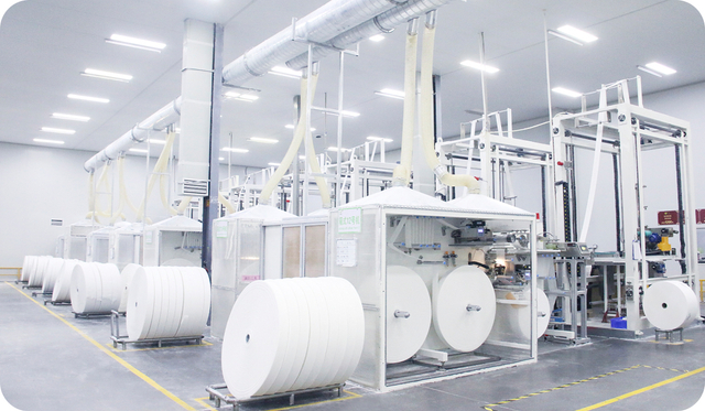 Ligne de production de noyaux de coton moelleux